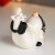 Сувенир керамика "Дедушка Мороз, чёрный полосатый колпак, большая звезда" 9,5х6,4х12,4 см