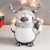 Сувенир полистоун "Пингвинчик в шарфике и колпаке с рожками, с подарком"МИКС 15,5х13х9 см