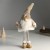 Кукла интерьерная "Дед Мороз в бежевой шубке со звездой на колпаке" 19х12х45 см