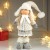 Кукла интерьерная "Девочка в зимнем наряде и в шапке-ушанке" 52х10х15 см