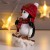 Сувенир полистоун "Пингвин Рико в красном колпаке и шарфе, на лыжах" 11х5,5х7,5 см