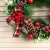 Венок новогодний d- 26 см "Уютная сказка" бантики в клетку шишки шарики