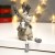 Сувенир полистоун свет "Лосик с серебристыми рогами со свечой" МИКС 15,5х7х8,7 см