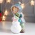 Сувенир полистоун "Малышка в голубом пальто лепит снеговика" 23х11,5х14,5 см