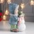 Сувенир полистоун "Малышка в голубом пальто лепит снеговика" 23х11,5х14,5 см