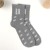 Подарок носки с принтом в банке "Не мерзни" (мужские, цвет черный)